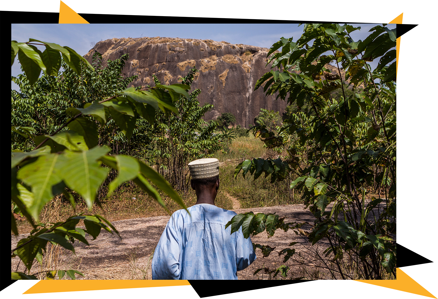 A man walking on a path in Africa