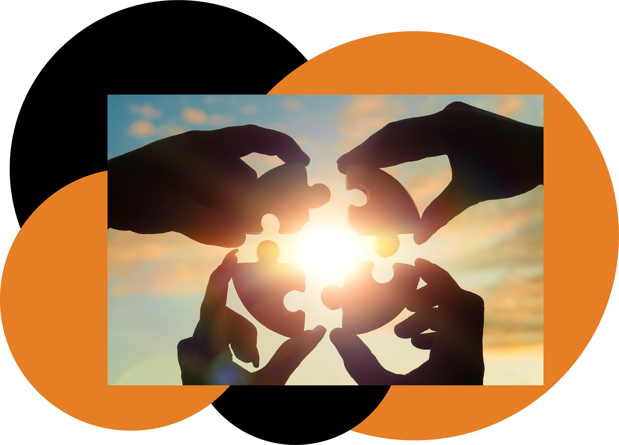 two sets of hands holding 4 piece puzzles with sun shining through gaps